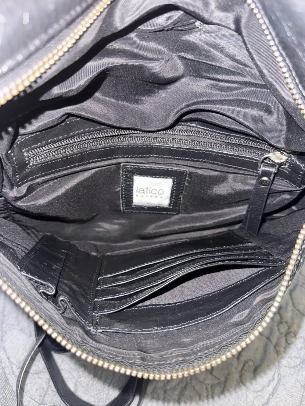 Latico Black Perforated Leather Riley Mini Backpack